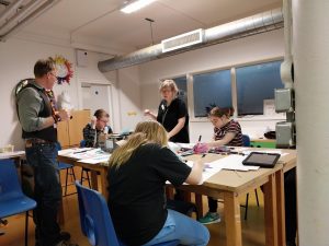 Students and Teaching Assistants in the Art room