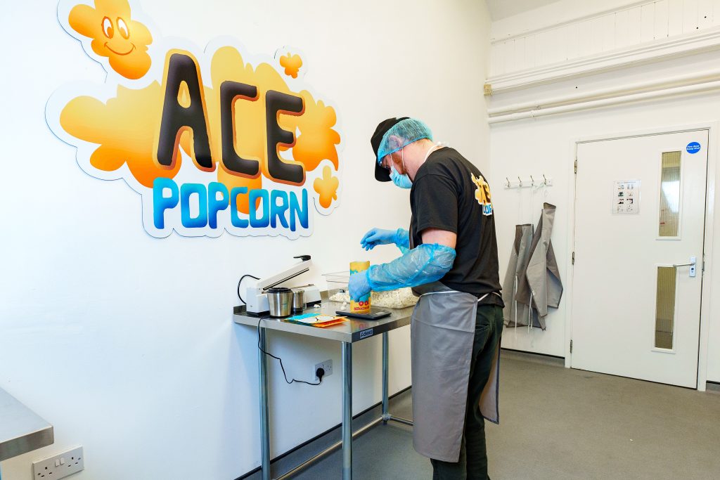 Production Assistant packaging with ACE logo above them